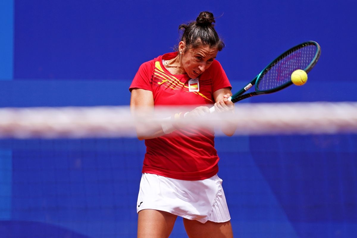 Jul 28, 2024; Paris, France; Sara Sorribes Tormo (ESP) hits the ball against  Barbora Krejcikova (CZE) in the women’s tennis singles first round during the Paris 2024 Olympic Summer Games at Stade Roland Garros. Mandatory Credit: Amber Searls-Imagn Images