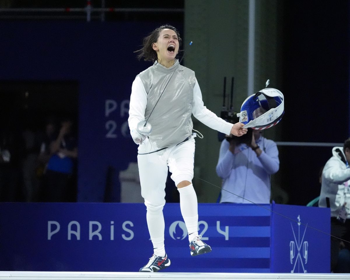 Jul 28, 2024; Paris, France; Lee Kiefer (USA) celebrates after defeating Alice Volpi (ITA) in a women's foil semifinal during the Paris 2024 Olympic Summer Games at Grand Palais. Mandatory Credit: Andrew P. Scott-USA TODAY Sports