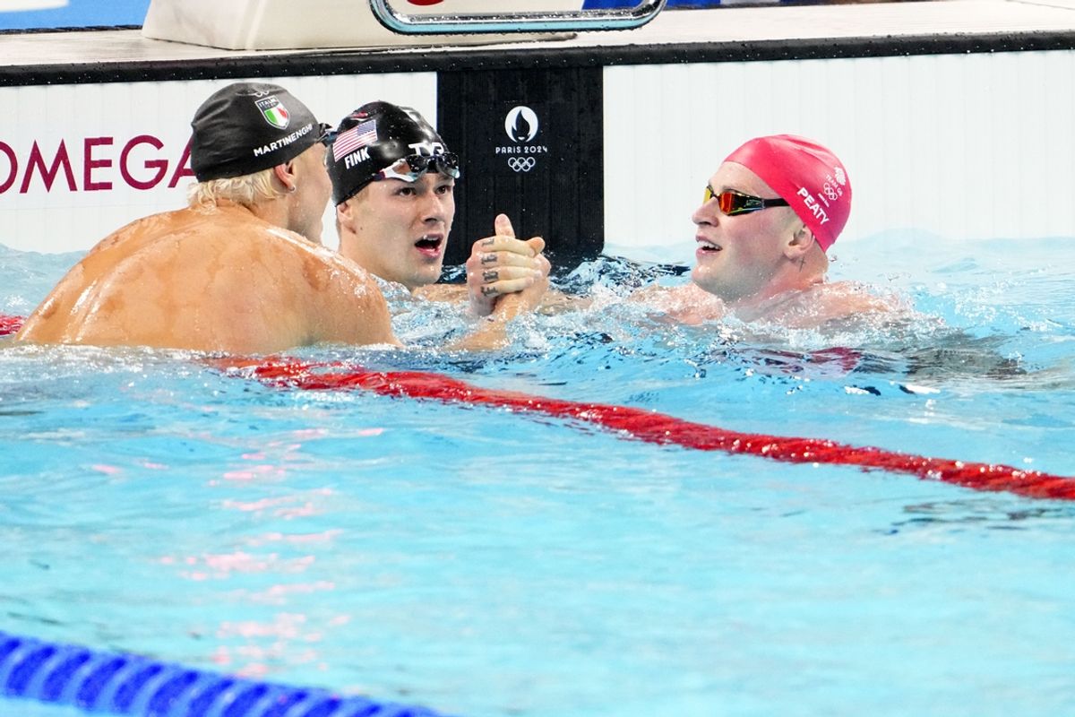 Nicolo Martinenghi (Italy), Nic Fink (USA) and Adam Peaty (Great Britain) in the men’s 100-meter breaststroke final during the Paris 2024 Olympic Summer Games at Paris La Défense Arena. Mandatory Credit: Rob Schumacher-USA TODAY Sports