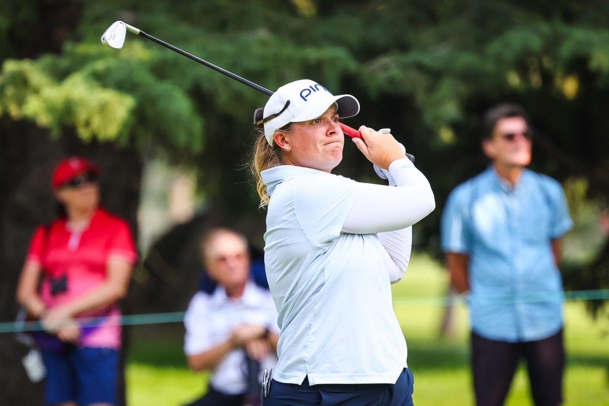 Jul 28, 2024; Calgary, Alberta, CAN; Lauren Coughlin plays her shot on the 11th hole during the final round of the CPKC Women's Open golf tournament. Mandatory Credit: Sergei Belski-USA TODAY Sports