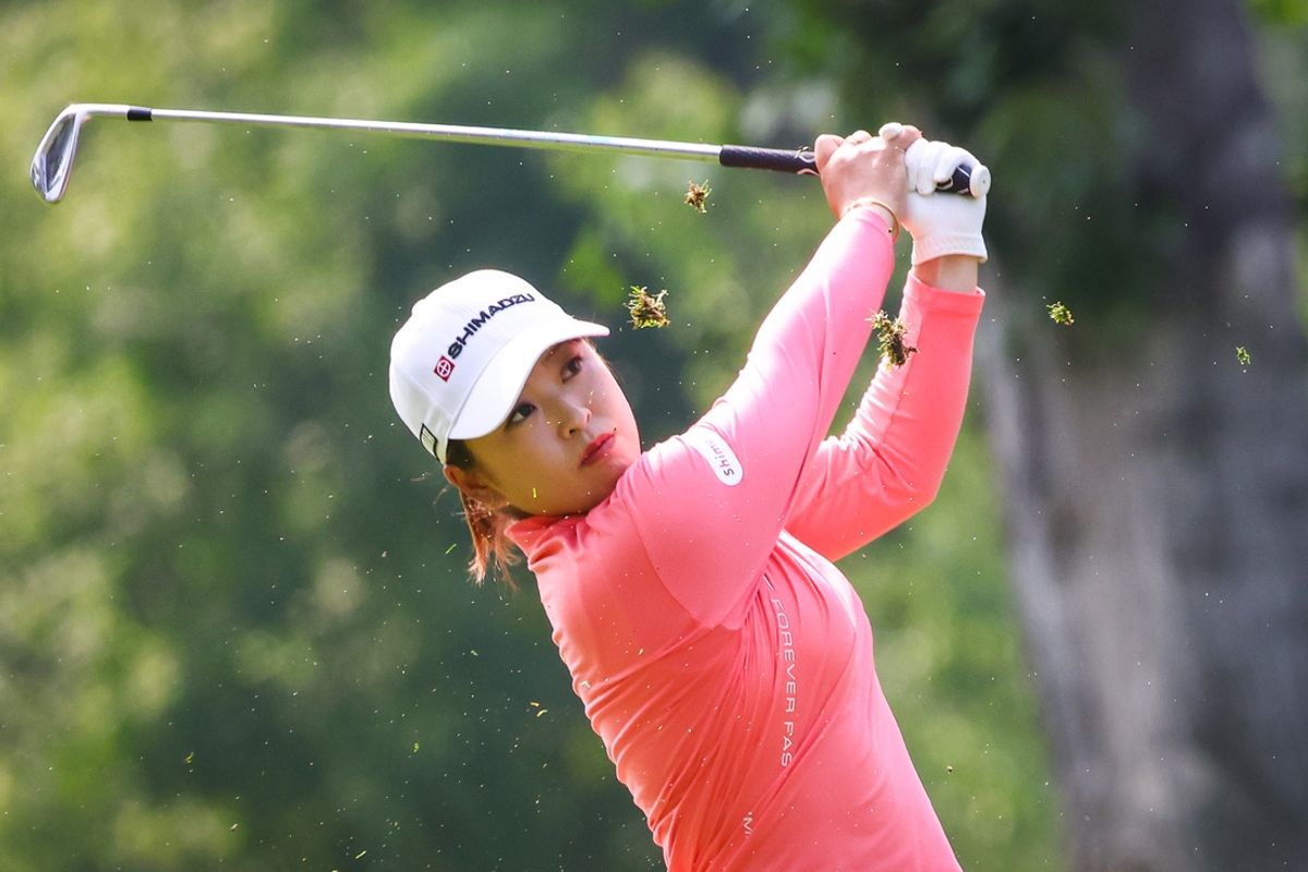 Jul 28, 2024; Calgary, Alberta, CAN; Mao Saigo plays her shot on the tens hole during the final round of the CPKC Women's Open golf tournament. Mandatory Credit: Sergei Belski-Imagn Images