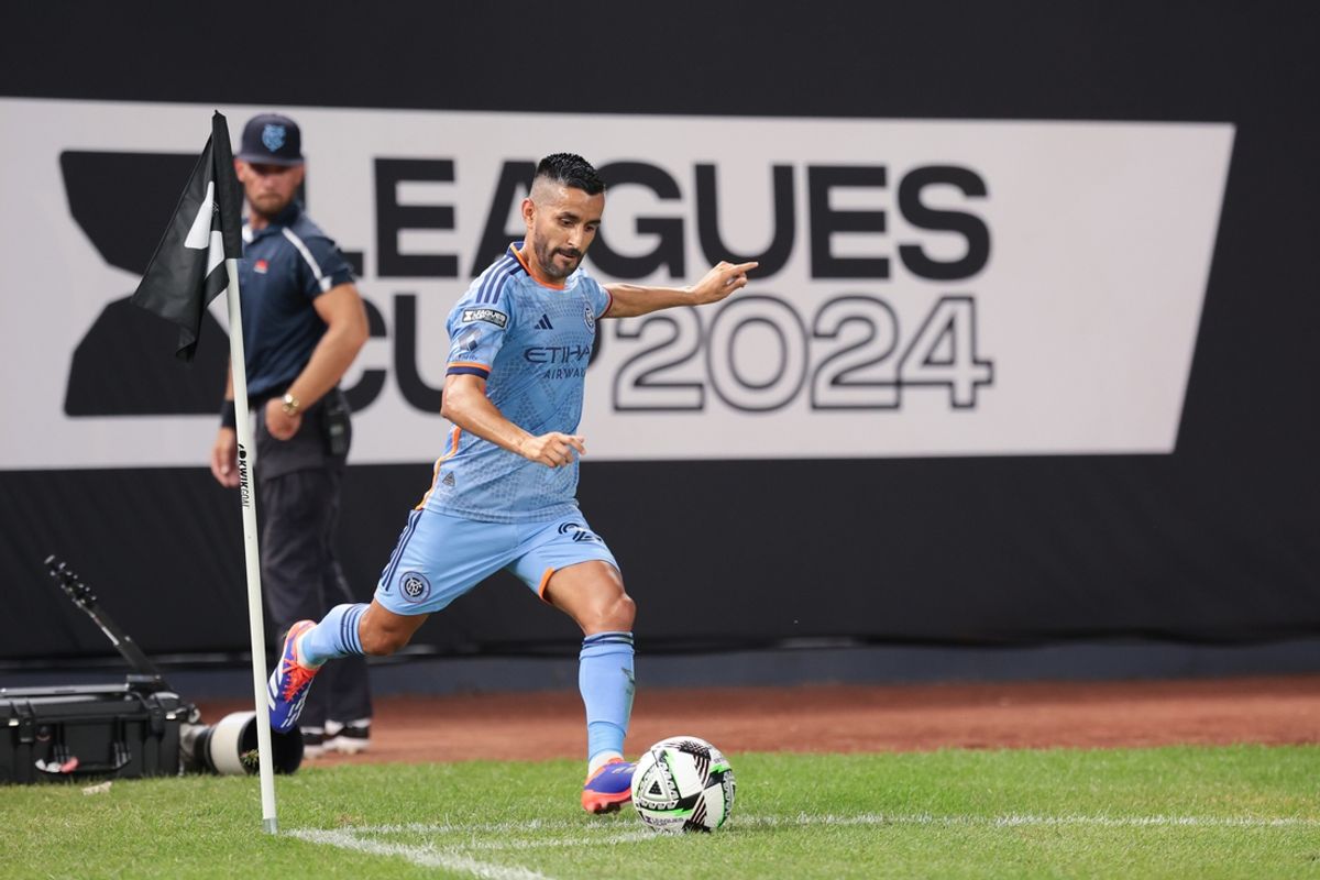 Jul 28, 2024; Bronx, New York, USA; New York City FC midfielder Maxi Moralez (27) inserts a corner during the first half against Queretaro FC at Yankee Stadium. Mandatory Credit: Vincent Carchietta-USA TODAY Sports