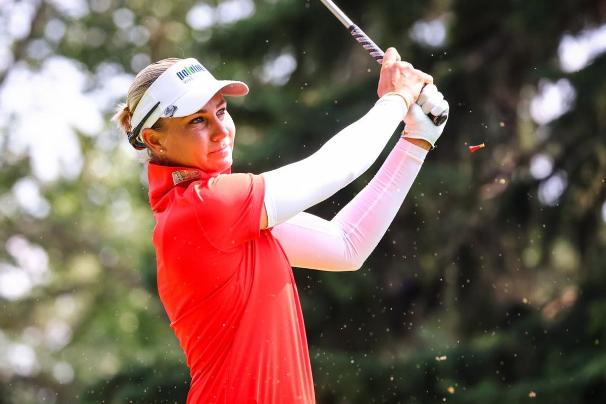 Jul 28, 2024; Calgary, Alberta, CAN; Ariya Jutanugarn plays her shot from the fifth tee during the final round of the CPKC Women's Open golf tournament. Mandatory Credit: Sergei Belski-Imagn Images