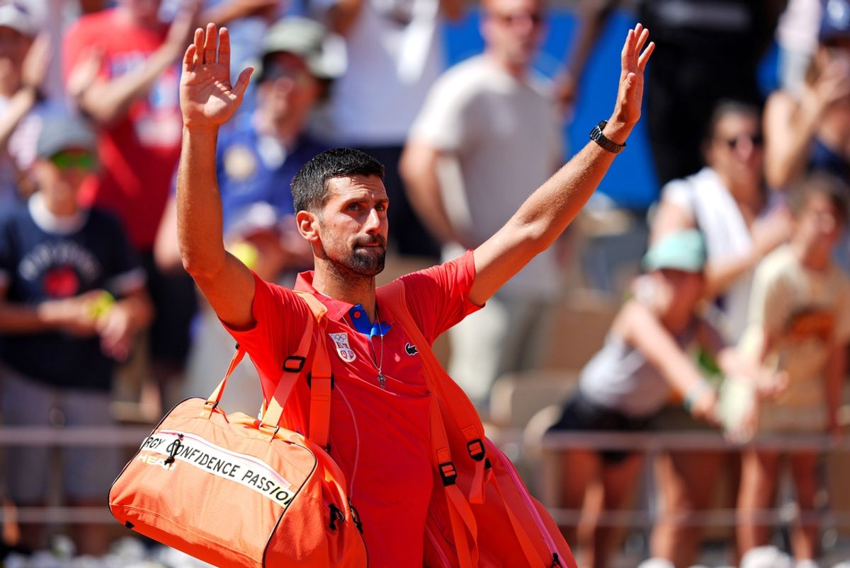 Paris, France; Novak Djokovic (SRB) hits autographed balls into the crowd at the Paris 2024 Olympic Summer Games at Stade Roland Garros. Mandatory Credit: Amber Searls-USA TODAY Sports