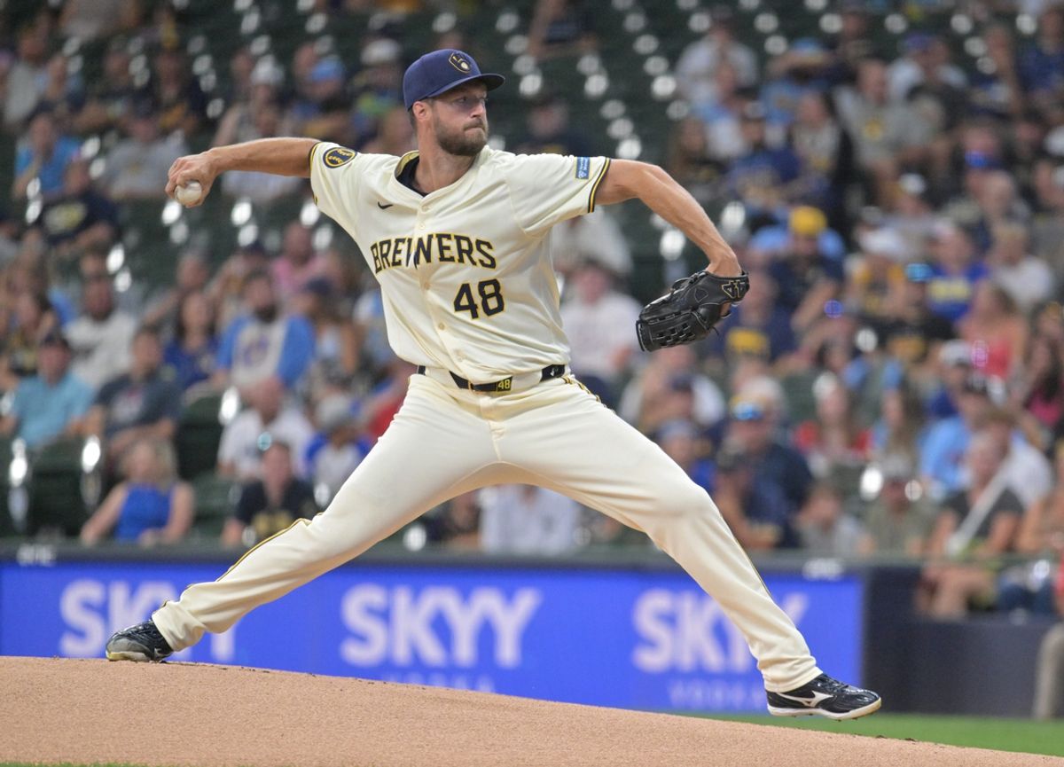 Jul 29, 2024; Milwaukee, Wisconsin, USA; Milwaukee Brewers starting pitcher Colin Rea (48) delivers a pitch against the Atlanta Braves in the first inning at American Family Field. Mandatory Credit: Michael McLoone-USA TODAY Sports