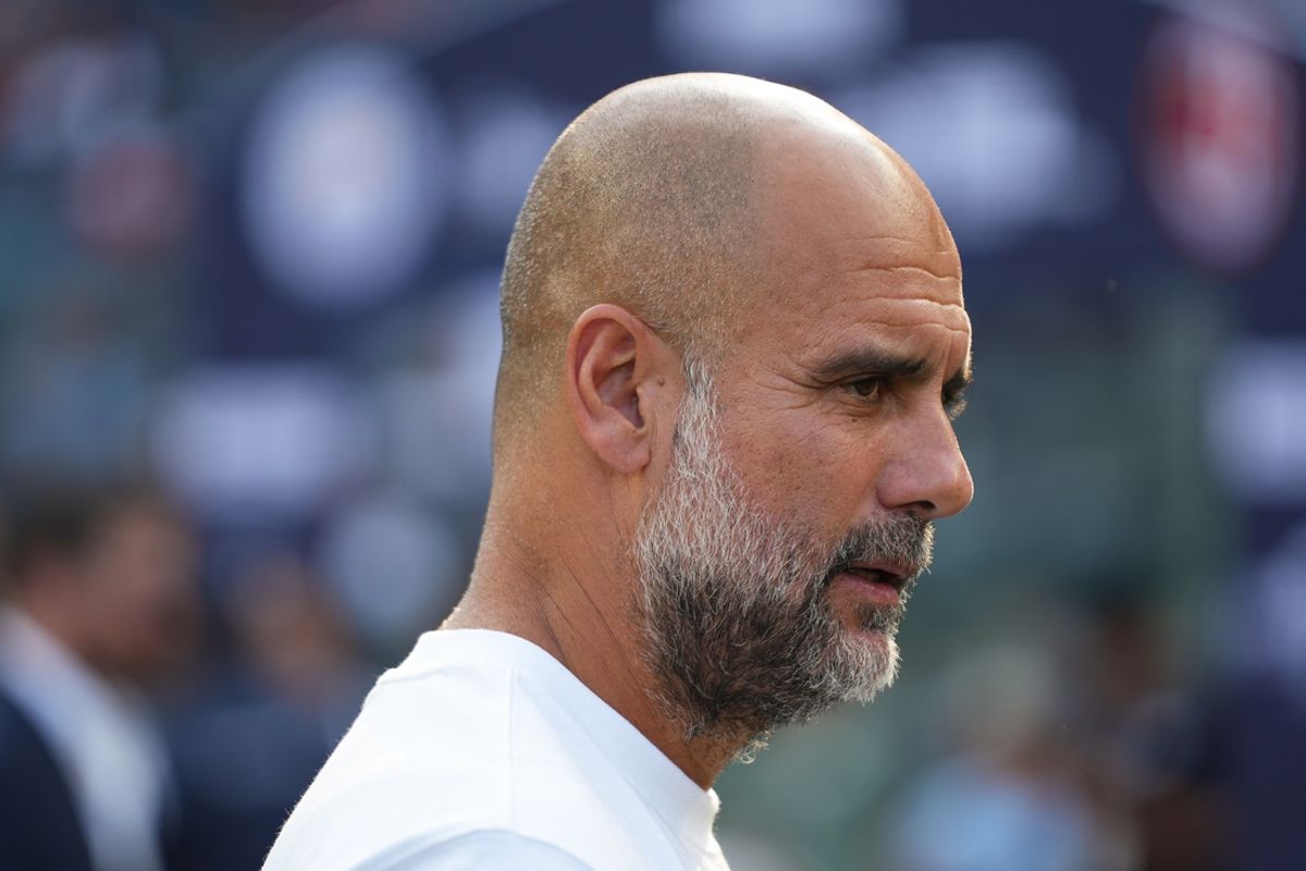 Jul 27, 2024; New York, NY, USA; Manchester City head coach Pep Guardiola looks before the match against AC Milan at Yankee Stadium. Mandatory Credit: Lucas Boland-Imagn Images