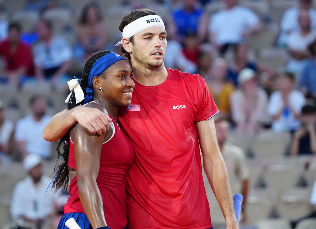 Jul 30, 2024; Paris, France;  Taylor Fritz (USA) and Coco Gauff (USA) react during a mixed doubles tennis match during the Paris 2024 Olympic Summer Games at Stade Roland Garros. Mandatory Credit: Kirby Lee-Imagn Images