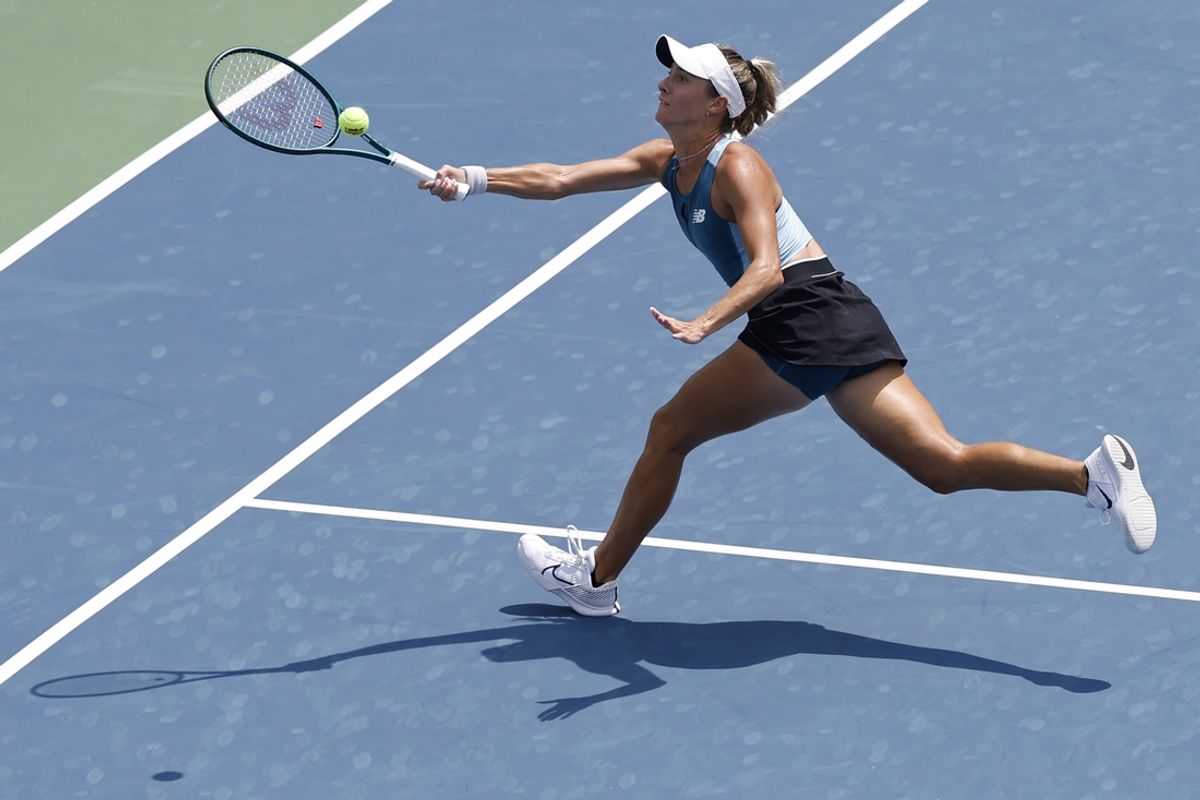 Jul 30, 2024; Washington, DC, USA; McCartney Kessler (USA) reaches for a volley against Marie Bouzkova (CZE) (not pictured) on day four of the Mubadala Citi DC Open at Rock Creek Park Tennis Center. Mandatory Credit: Geoff Burke-Imagn Images