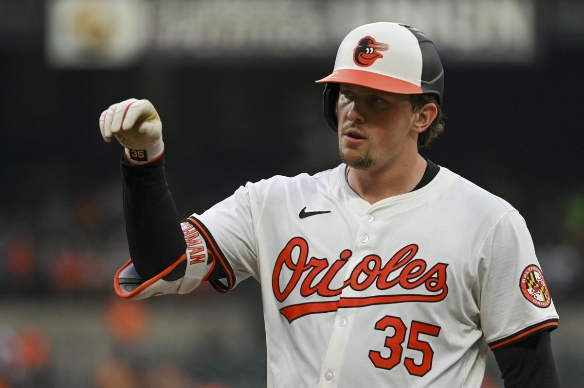 Jul 30, 2024; Baltimore, Maryland, USA;  Baltimore Orioles catcher Adley Rutschman (35) reacts after hitting a third inning single against the Toronto Blue Jays at Oriole Park at Camden Yards. Mandatory Credit: Tommy Gilligan-Imagn Images