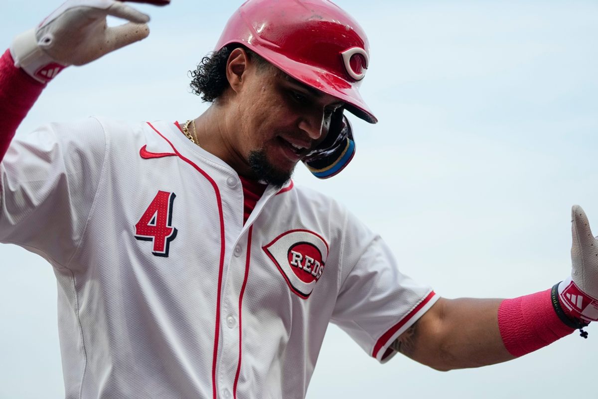 Cincinnati Reds designated hitter Santiago Espinal (4) celebrates a two-run home run in the second inning of the MLB National League game between the Cincinnati Reds and the Chicago Cubs at Great American Ball Park in downtown Cincinnati on Tuesday, July 30, 2024.