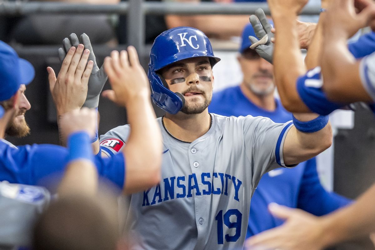 Jul 30, 2024; Chicago, Illinois, USA; Kansas City Royals designated hitter Michael Massey (19) celebrates his home run in the dugout with teammates during the third inning against the Chicago White Sox at Guaranteed Rate Field. Mandatory Credit: Patrick Gorski-USA TODAY Sports