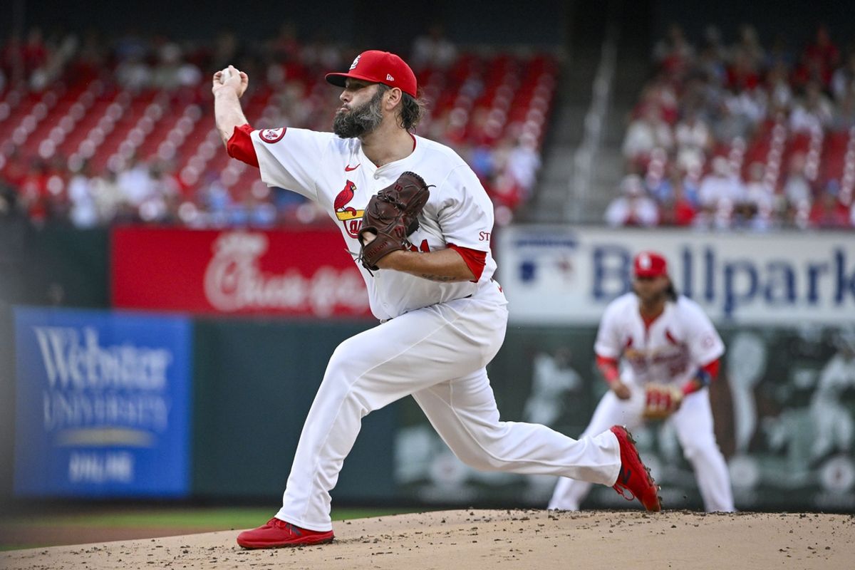 Jul 30, 2024; St. Louis, Missouri, USA;  St. Louis Cardinals starting pitcher Lance Lynn (31) pitches against the Texas Rangers during the first inning at Busch Stadium. Mandatory Credit: Jeff Curry-USA TODAY Sports