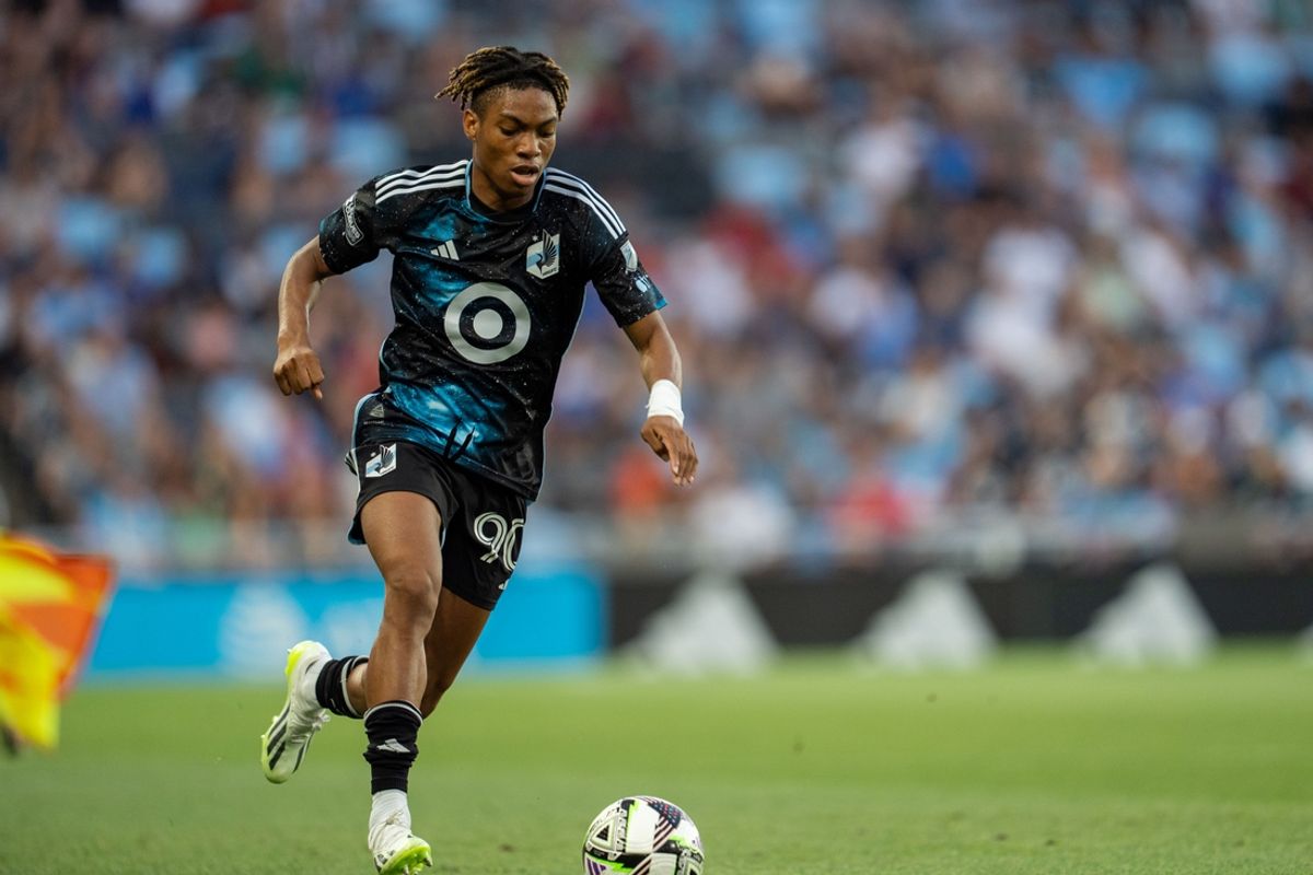 Jul 30, 2024; St. Paul, Minnesota, USA; Minnesota United forward Loic Mesanvi (90) brings the ball upfield against Necaxa in the first half United at Allianz Field. Mandatory Credit: Matt Blewett-USA TODAY Sports