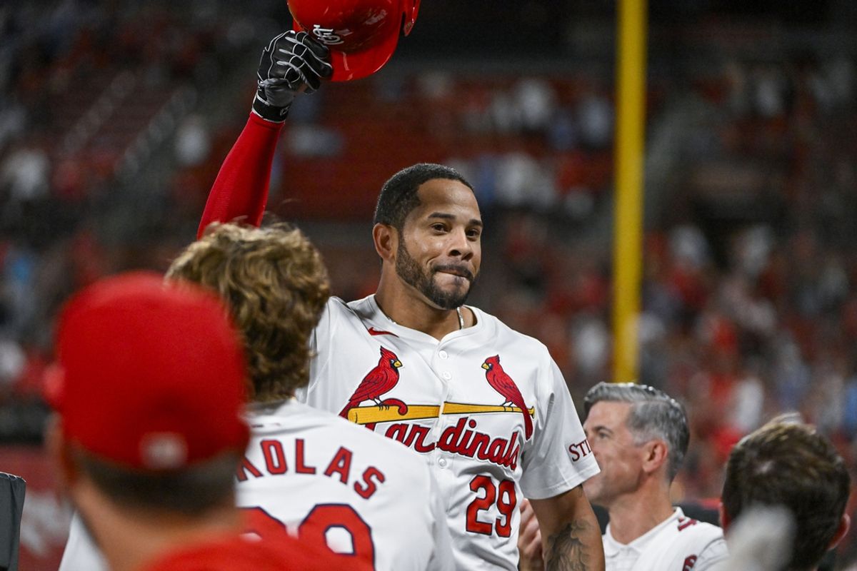 Jul 30, 2024; St. Louis, Missouri, USA;  St. Louis Cardinals pinch hitter Tommy Pham (29) salutes the fans as he receives a curtain call after hitting a grand slam home run against the Texas Rangers during the fifth inning at Busch Stadium. Mandatory Credit: Jeff Curry-USA TODAY Sports