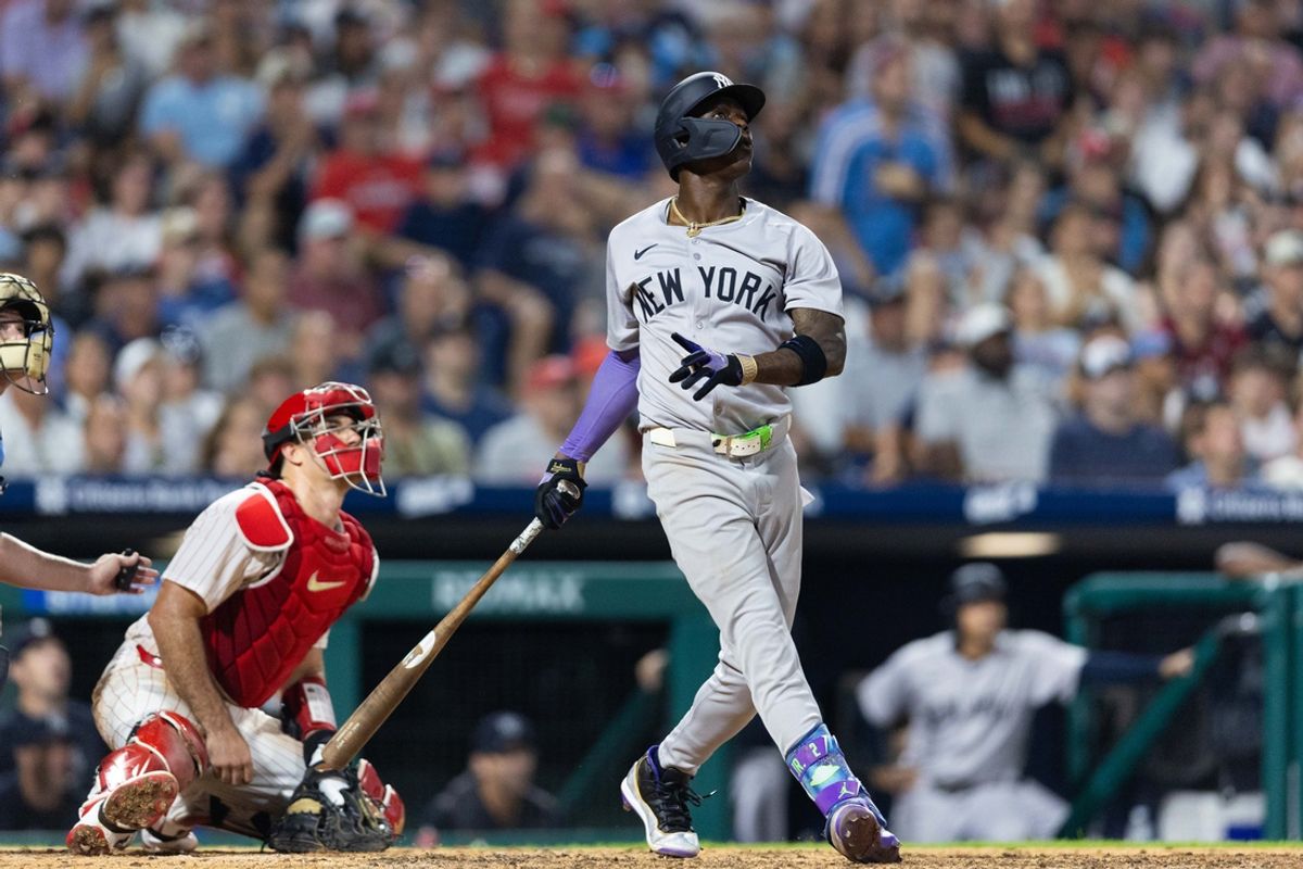 Jul 30, 2024; Philadelphia, Pennsylvania, USA; New York Yankees third base Jazz Chisholm Jr. (13) hits a three RBI home run during the seventh inning against the Philadelphia Phillies at Citizens Bank Park. Mandatory Credit: Bill Streicher-USA TODAY Sports