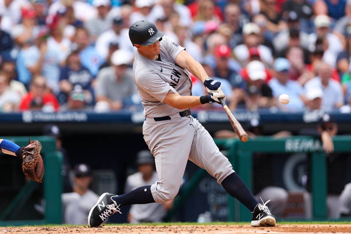 Jul 31, 2024; Philadelphia, Pennsylvania, USA;  New York Yankees third base DJ LeMahieu (26) hits a grand slam during the second inning against the Philadelphia Phillies at Citizens Bank Park. Mandatory Credit: Bill Streicher-USA TODAY Sports
