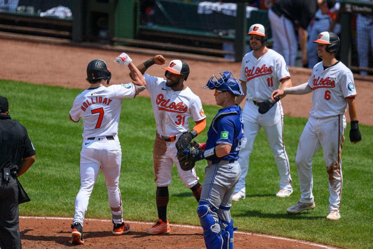 Jul 31, 2024; Baltimore, Maryland, USA; Baltimore Orioles second baseman Jackson Holliday (7) celebrates with outfielder Cedric Mullins (31), third baseman Jordan Westburg (11), and first baseman Ryan Mountcastle (6) after hitting a home run against the Toronto Blue Jays during the fifth inning at Oriole Park at Camden Yards. Mandatory Credit: Reggie Hildred-USA TODAY Sports