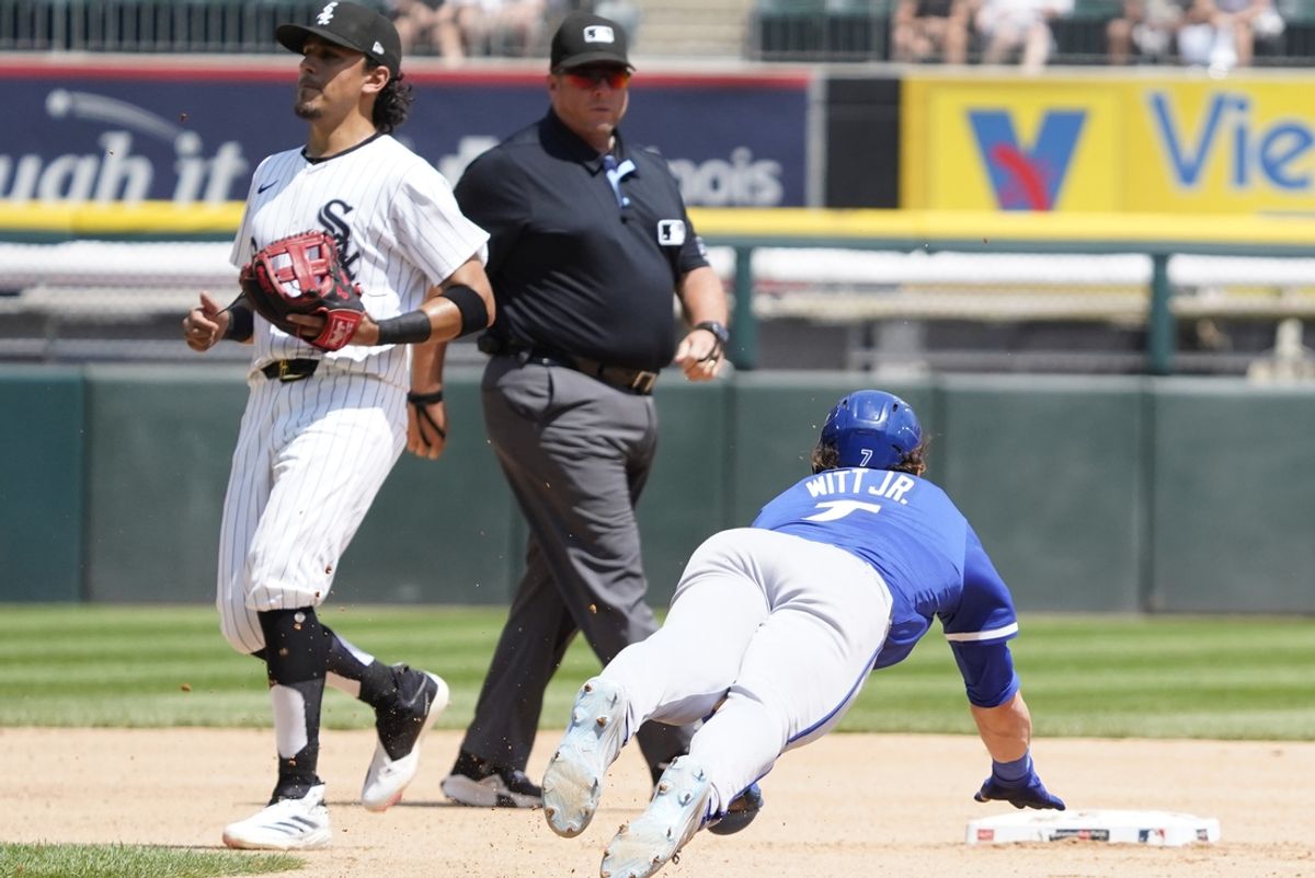 Jul 31, 2024; Chicago, Illinois, USA; Kansas City Royals shortstop Bobby Witt Jr. (7) steals second base against Chicago White Sox shortstop Nicky Lopez (8) during the third inning at Guaranteed Rate Field. Mandatory Credit: David Banks-USA TODAY Sports