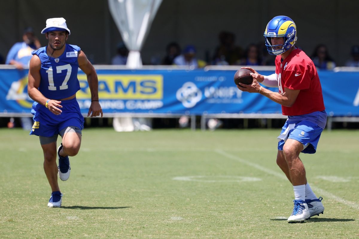 Los Angeles Rams wide receiver Puka Nacua (17) and quarterback Matthew Stafford (9) participate in jog through during training camp at Loyola Marymount University. Mandatory Credit: Kiyoshi Mio-USA TODAY Sports
