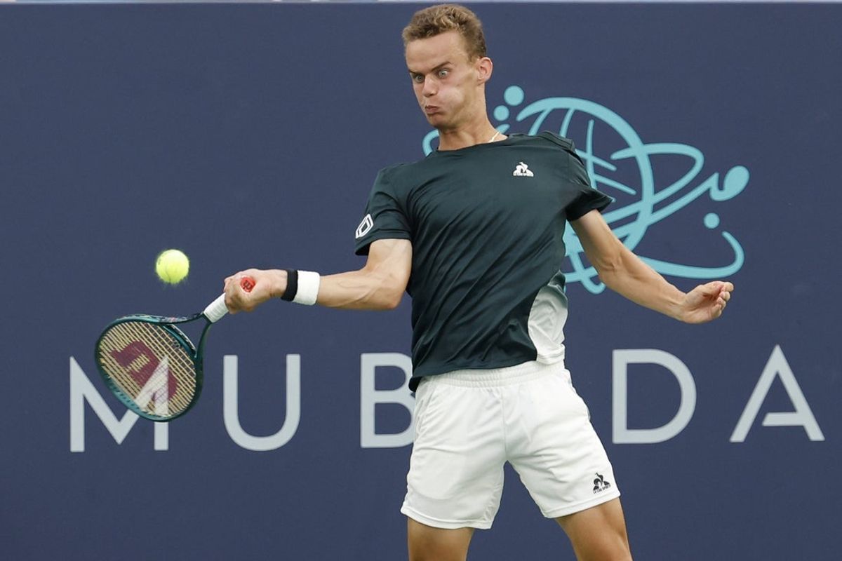 Jul 31, 2024; Washington, DC, USA; Luca Van Assche (FRA) hits a forehand against Andrey Rublev (not pictured) on day five of the Mubadala Citi DC Open at Rock Creek Park Tennis Center. Mandatory Credit: Geoff Burke-Imagn Images