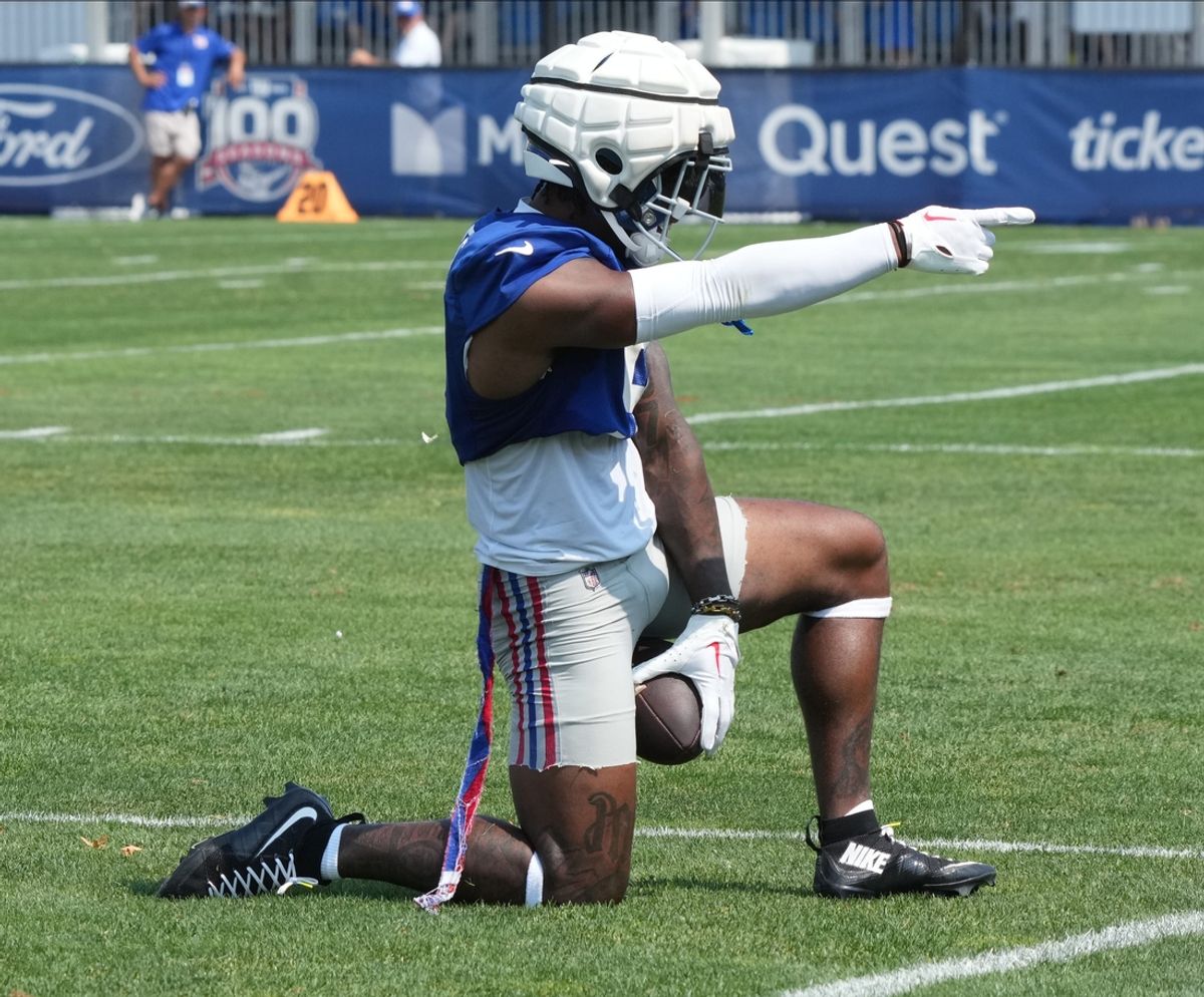 East Rutherford, NJ -- August 1, 2024 -- Wide receiver, Malik Nabers makes this TD catch from a Daniel Jones pass during practice today at training camp for the New York Giants.