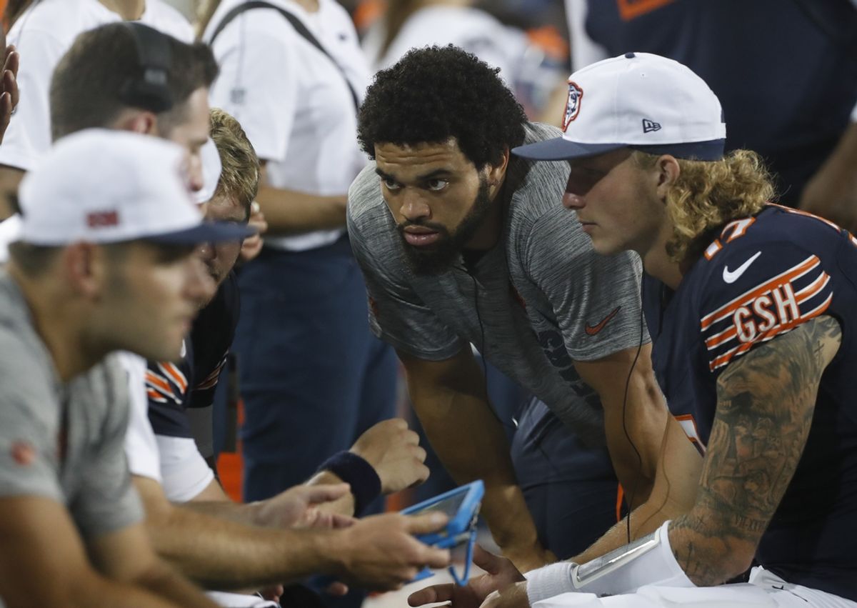 Aug 1, 2024; Canton, Ohio, USA;  Chicago Bears quarterback Caleb Williams (RC) listens in the quarterback huddle on he sidelines against the Houston Texans during the third quarter at Tom Benson Hall of Fame Stadium. Mandatory Credit: Charles LeClaire-USA TODAY Sports