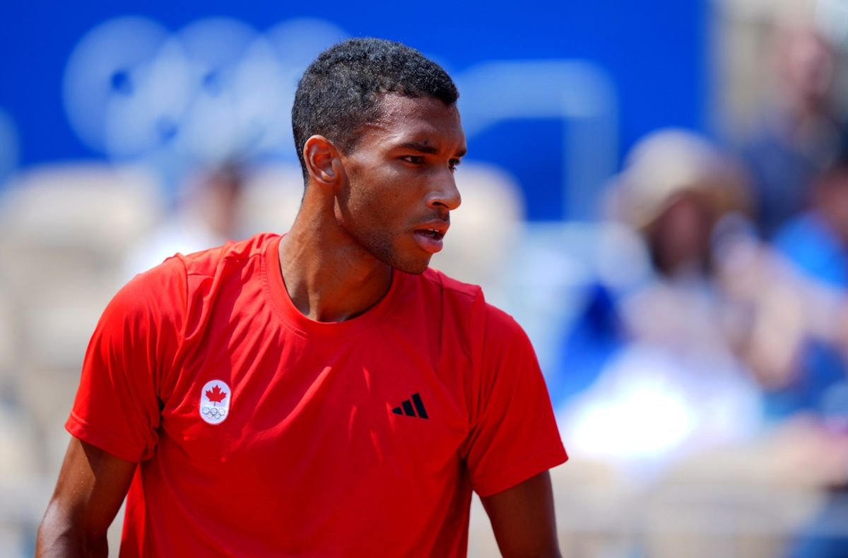 Aug 2, 2024; Paris, France; Felix Auger-Aliassime (CAN) reacts in a match against Carlos Alcaraz (not pictured) during the Paris 2024 Olympic Summer Games at Stade Roland Garros. Mandatory Credit: Amber Searls-Imagn Images