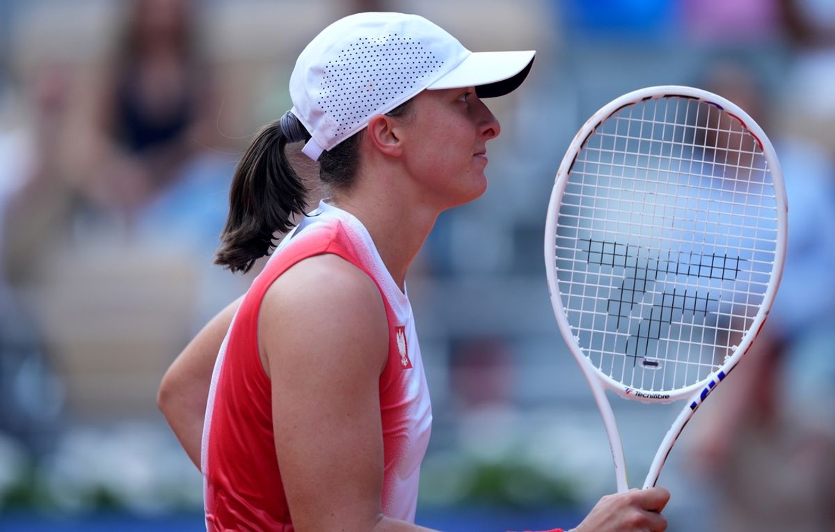 Aug 2, 2024; Paris, France; Iga Swiatek (POL) reacts after a point against Anna Karolina Schmiedlova (not pictured) in the bronze medal match during the Paris 2024 Olympic Summer Games at Stade Roland Garros. Mandatory Credit: Amber Searls-USA TODAY Sports