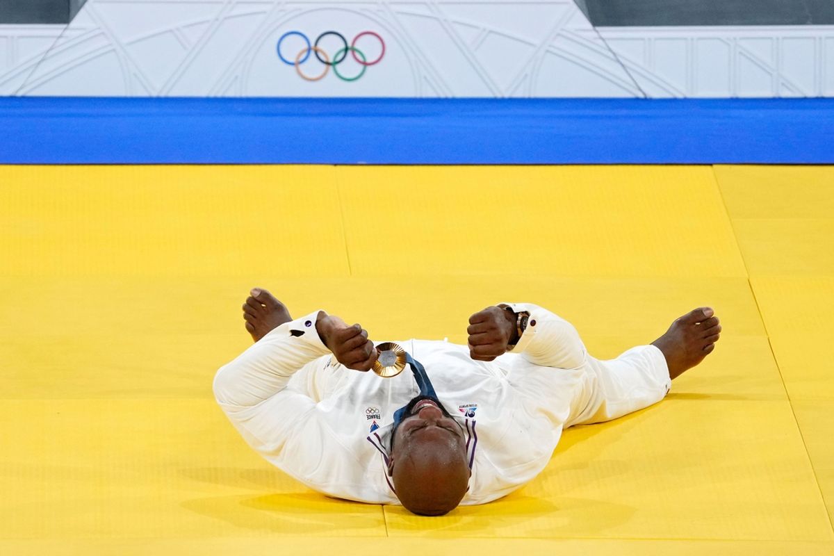 Aug 2, 2024; Paris, France; Teddy Riner (FRA) celebrates his gold medal after the medal ceremony for the men's +100kg during the Paris 2024 Olympic Summer Games at Champ-de-Mars Arena. Mandatory Credit: Jack Gruber-USA TODAY Sports