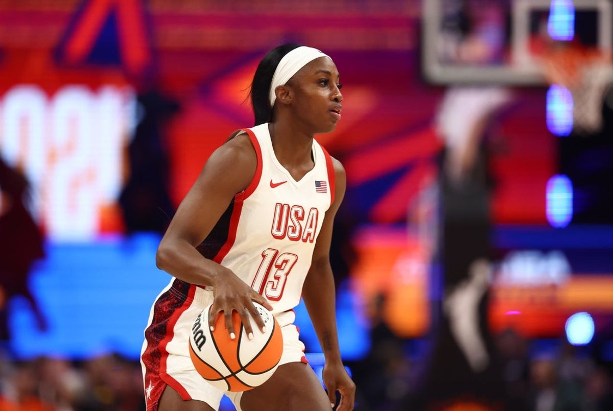 Jul 20, 2024; Phoenix, AZ, USA; USA Women's National Team guard Jackie Young (13) during the WNBA All Star game at Footprint Center. Mandatory Credit: Mark J. Rebilas-Imagn Images