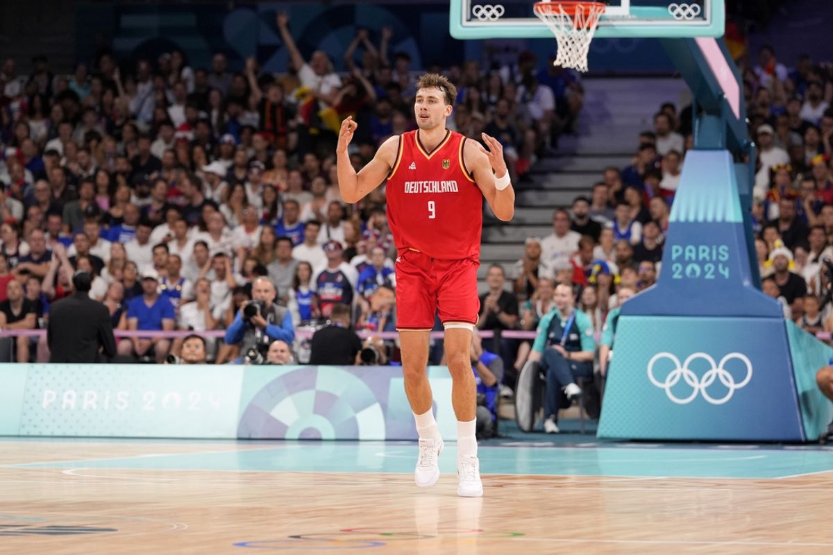Germany guard Franz Wagner (9) reacts after scoring in the first half in a men’s group B basketball game during the Paris 2024 Olympic Summer Games at Stade Pierre-Mauroy. Mandatory Credit: John David Mercer-USA TODAY Sports