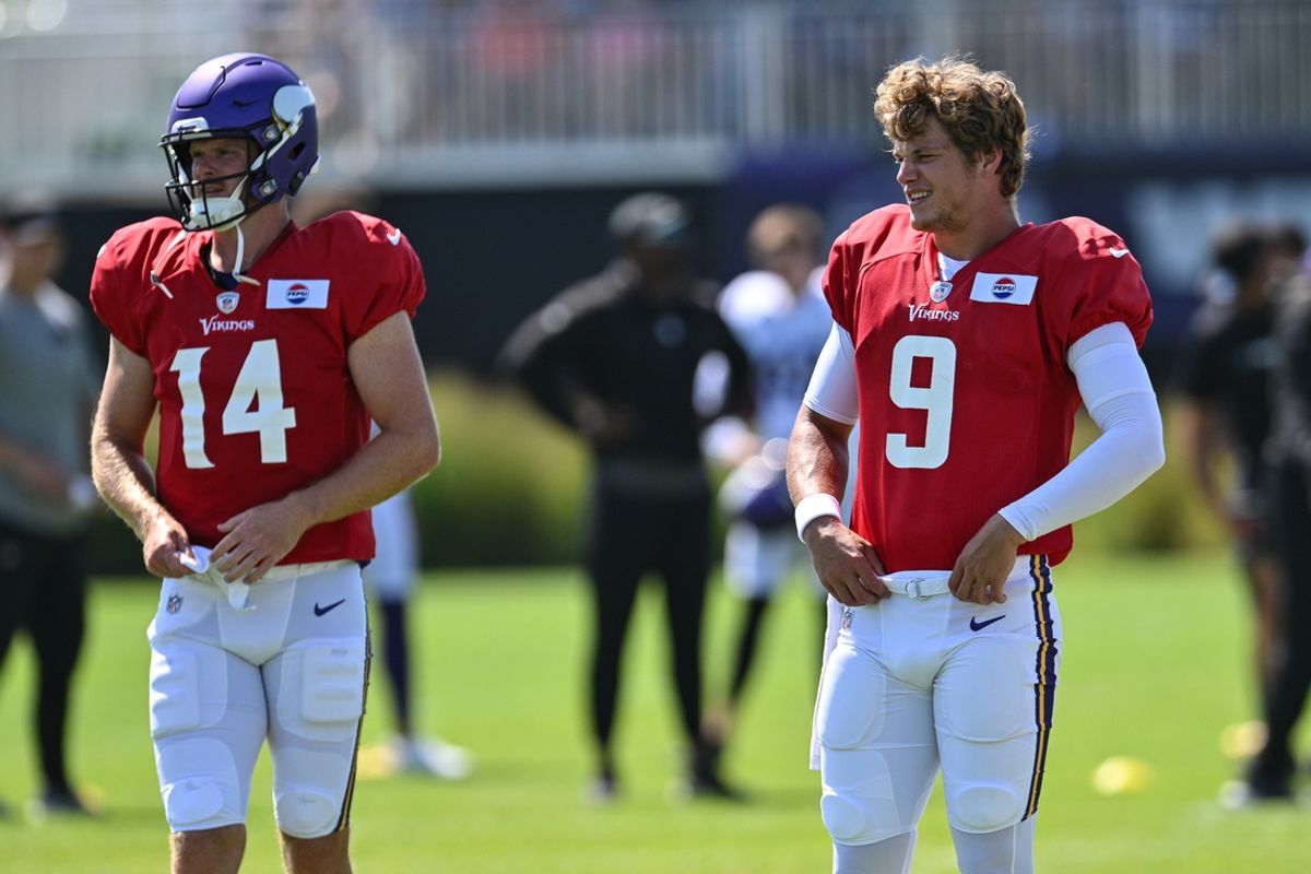 Aug 2, 2024; Eagan, MN, USA; Minnesota Vikings quarterback J.J. McCarthy (9) and quarterback Sam Darnold (14) warm up during practice at Vikings training camp in Eagan, MN. Mandatory Credit: Jeffrey Becker-USA TODAY Sports