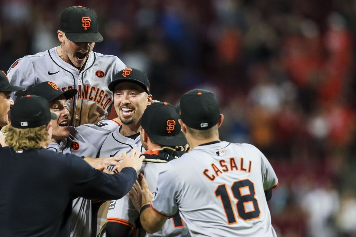 Aug 2, 2024; Cincinnati, Ohio, USA; San Francisco Giants starting pitcher Blake Snell (7) celebrates with teammates after throwing a no-hitter against the Cincinnati Reds at Great American Ball Park. Mandatory Credit: Katie Stratman-USA TODAY Sports