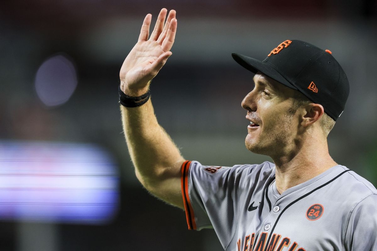 Aug 2, 2024; Cincinnati, Ohio, USA; San Francisco Giants first baseman Mark Canha (16) high fives teammates after the victory over the Cincinnati Reds at Great American Ball Park. Mandatory Credit: Katie Stratman-USA TODAY Sports