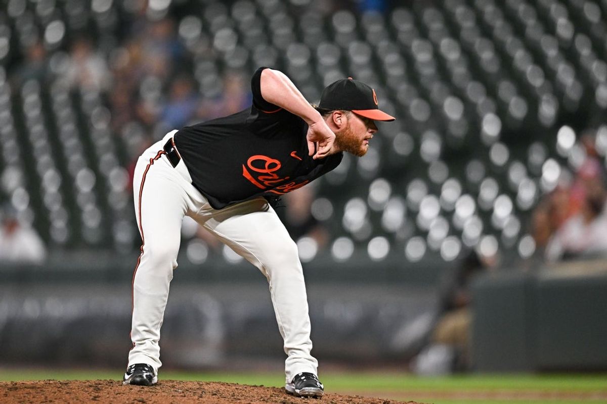 Jul 29, 2024; Baltimore, Maryland, USA; Baltimore Orioles pitcher Craig Kimbrel (46) prepares to throw a pitch during the eighth inning against the Toronto Blue Jays at Oriole Park at Camden Yards. Mandatory Credit: Reggie Hildred-Imagn Images