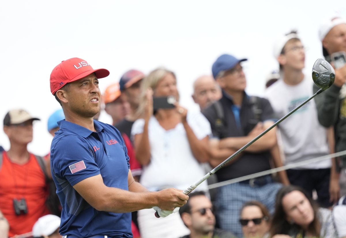 Aug 3, 2024; Saint-Quentin-en-Yvelines, France; Xander Schauffele hits his tee shot on the 3rd hole in the third round of men's golf stroke play during the Paris 2024 Olympic Summer Games at Le Golf National. Mandatory Credit: Michael Madrid-USA TODAY Sports