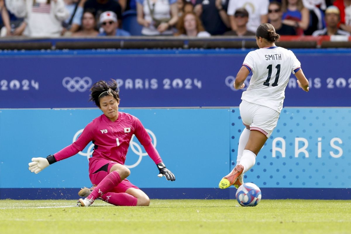 Aug 3, 2024; Paris, France; Japan goalkeeper Ayaka Yamashita (1) and United States forward Sophia Smith (11) during the Paris 2024 Olympic Summer Games at Parc des Princes. Mandatory Credit: Yukihito Taguchi-USA TODAY Sports