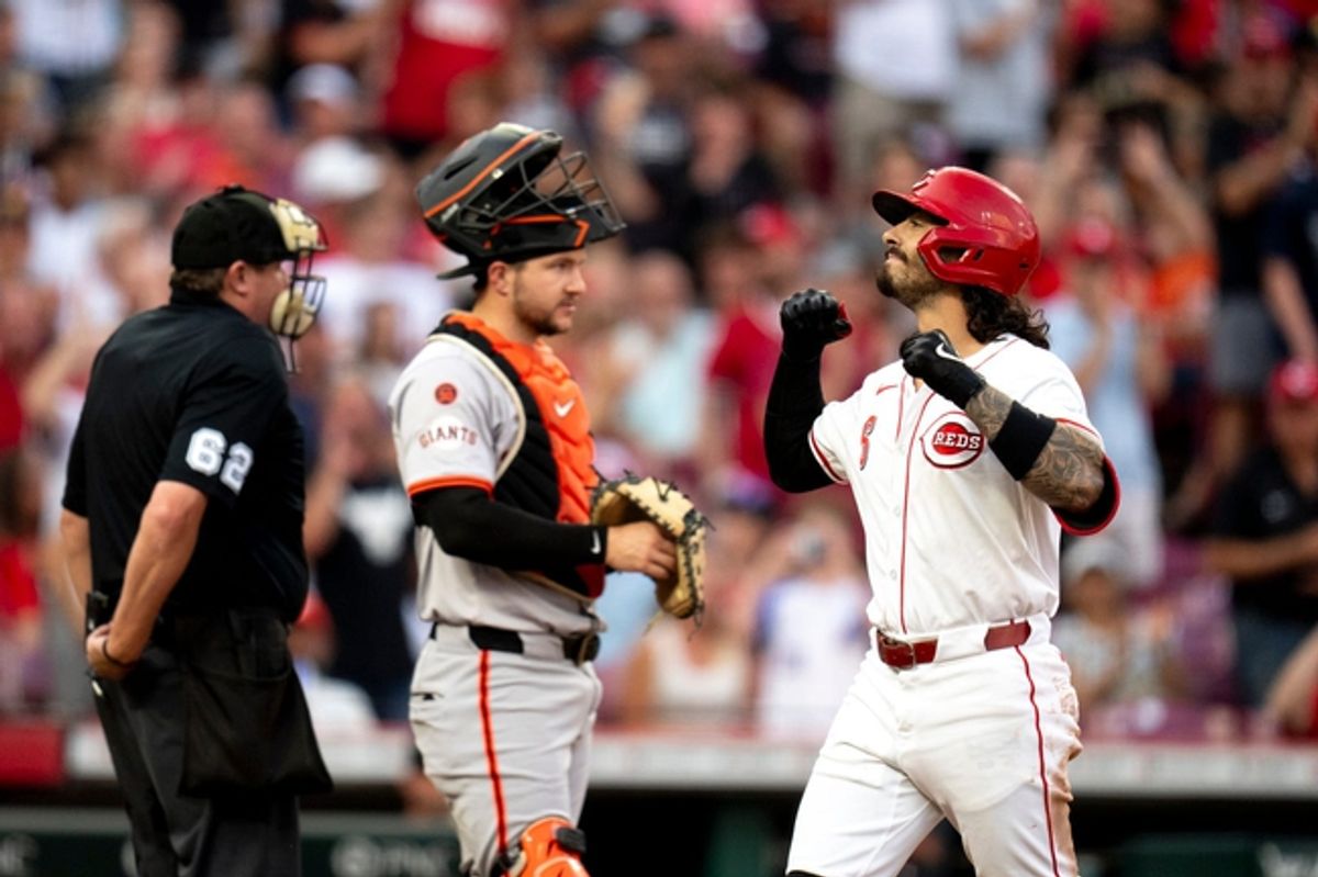 Cincinnati Reds second base Jonathan India (6) gestures as he crosses home plate after hitting a solo home run in the third inning of the MLB game between the Cincinnati Reds and the San Francisco Giants at Great American Ball Park in Cincinnati on Saturday, Aug. 3, 2024.