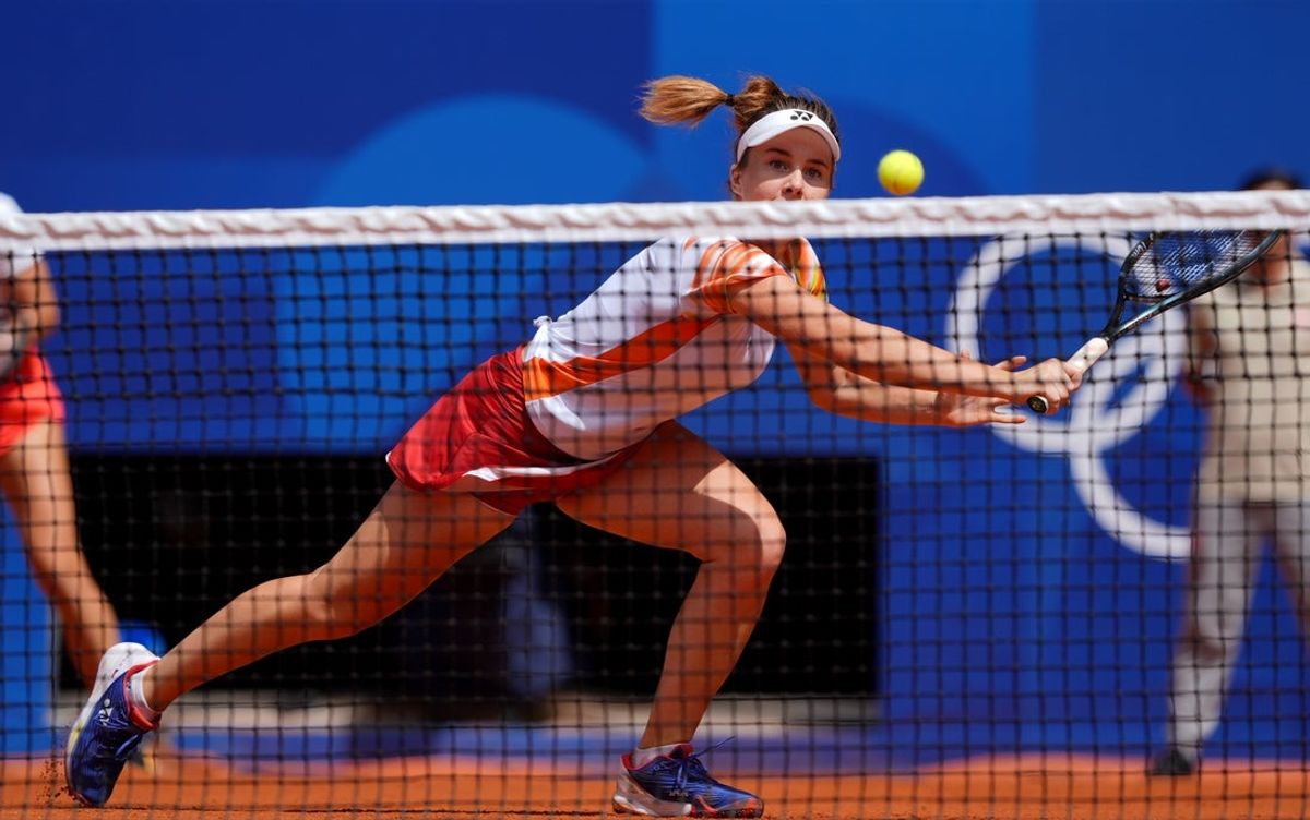 Aug 4, 2024; Paris, France; Linda Noskova (CZE) returns a shot against Spain in the women’s doubles bronze medal match during the Paris 2024 Olympic Summer Games at Stade Roland Garros. Mandatory Credit: Amber Searls-Imagn Images