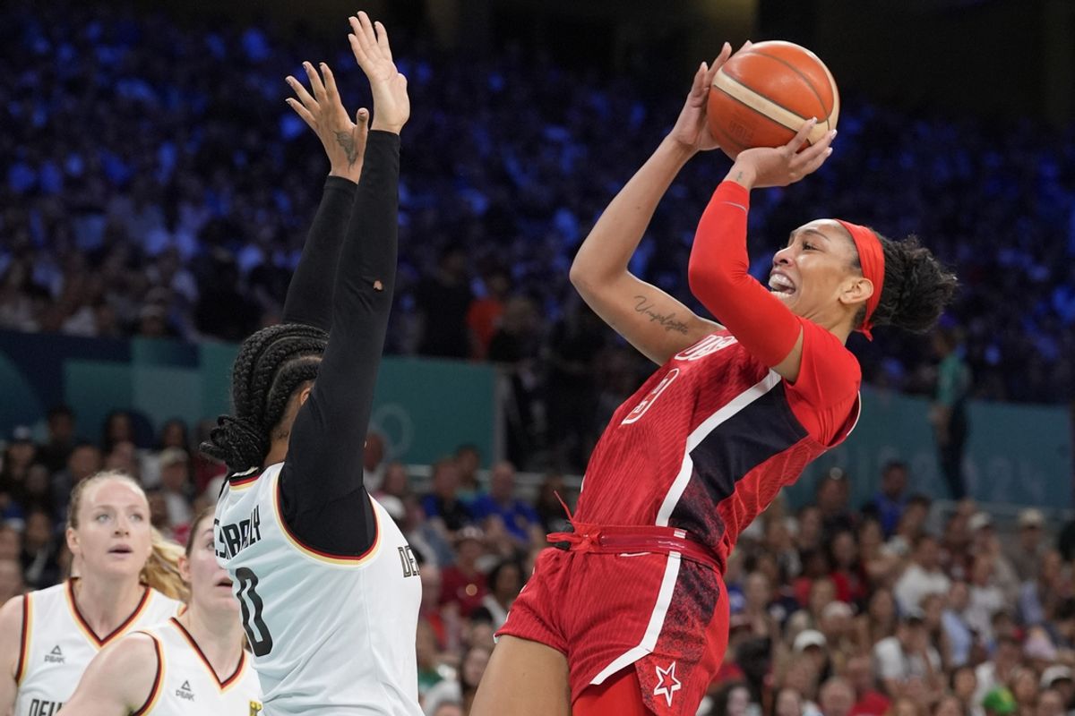 Aug 4, 2024; Villeneuve-d'Ascq, France; United States forward A'Ja Wilson (9) shoots against Germany forward Satou Sabally (0) in the first half in a women’s group C game during the Paris 2024 Olympic Summer Games at Stade Pierre-Mauroy. Mandatory Credit: John David Mercer-USA TODAY Sports