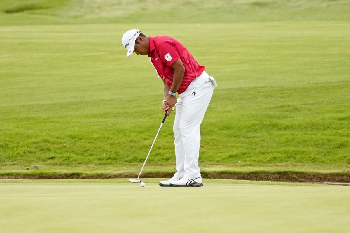 Aug 4, 2024; Saint-Quentin-en-Yvelines, France; Hideki Matsuyama of Team Japan putts on the 15th green during the final round of menís individual stroke play during the Paris 2024 Olympic Summer Games at Le Golf National. Mandatory Credit: Michael Madrid-USA TODAY Sports