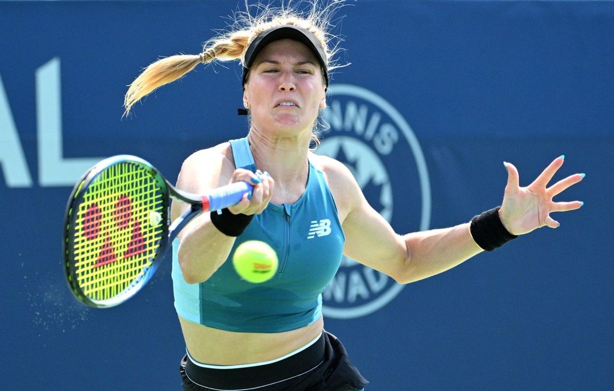 Aug 4, 2024; Toronto, Ontario, USA;  Eugenie Bouchard (CAN) plays a shot against Moyuka Uchijima (JPN) (not shown) during first round qualifying play at Sobeys Stadium. Mandatory Credit: Dan Hamilton-Imagn Images
