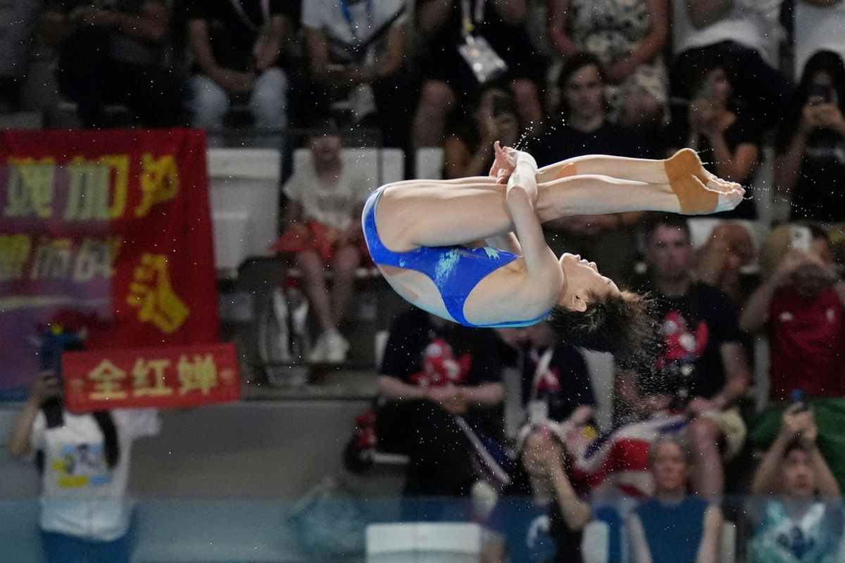 Paris, France; Hongchan Quan (CHN) competes in the womenís 10m platform during the Paris 2024 Olympic Summer Games at Aquatics Centre. Mandatory Credit: Katie Goodale-USA TODAY Sports