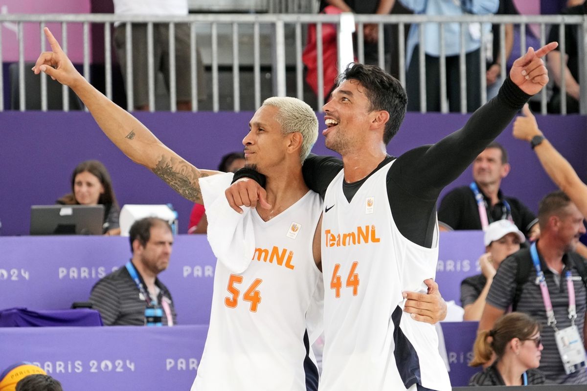 Aug 5, 2024; Paris, France; Netherlands player Worthy de Jong (54) and Arvin Slagter (44) celebrate after defeating Lithuania in the men’s 3x3 basketball semifinal during the Paris 2024 Olympic Summer Games at La Concorde 1. Mandatory Credit: Michael Madrid-USA TODAY Sports