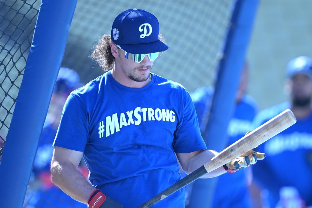 Aug 5, 2024; Los Angeles, California, USA;  Los Angeles Dodgers center fielder James Outman (33) during batting practice prior to the game against the Philadelphia Phillies at Dodger Stadium. Dodger players wore #MaxStrong shirts during pregame to honor Max, the 3-year old son of first baseman Freddie Freeman (5), who was diagnosed with Guillian-Barre syndrome. Mandatory Credit: Jayne Kamin-Oncea-Imagn Images
