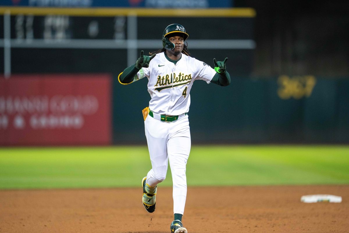 Aug 5, 2024; Oakland, California, USA;  Oakland Athletics outfielder Lawrence Butler (4) celebrates around the bases after the solo homer against the Chicago White Sox during the sixth inning at Oakland-Alameda County Coliseum. Mandatory Credit: Neville E. Guard-USA TODAY Sports