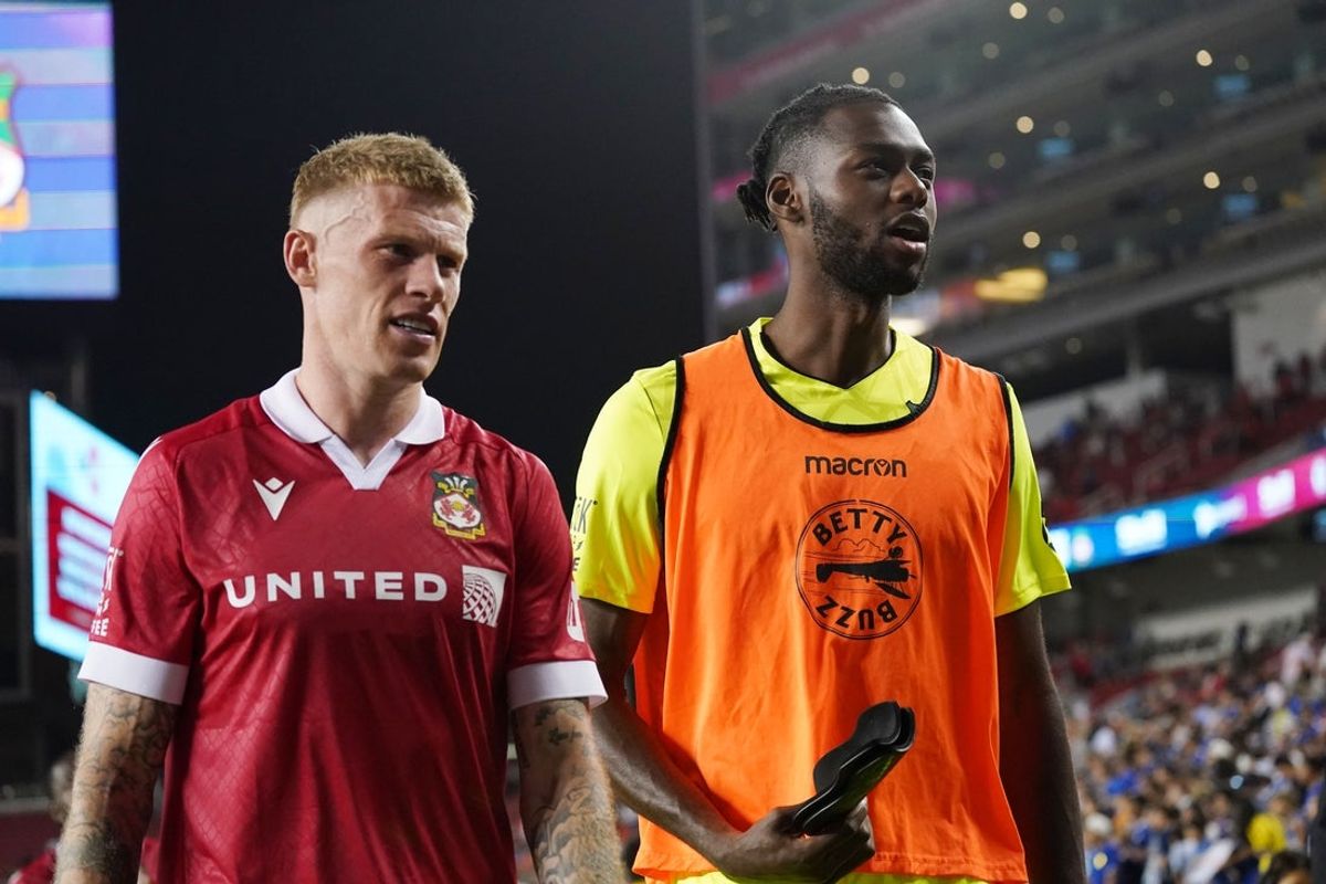 Jul 24, 2024; Santa Clara, CA, USA; Wrexham midfielder James McClean (23) and Wrexham goalie Arthur Okonkwo (1) walk off the field after the match against Chelsea at Levi's Stadium. Mandatory Credit: David Gonzales-Imagn Images
