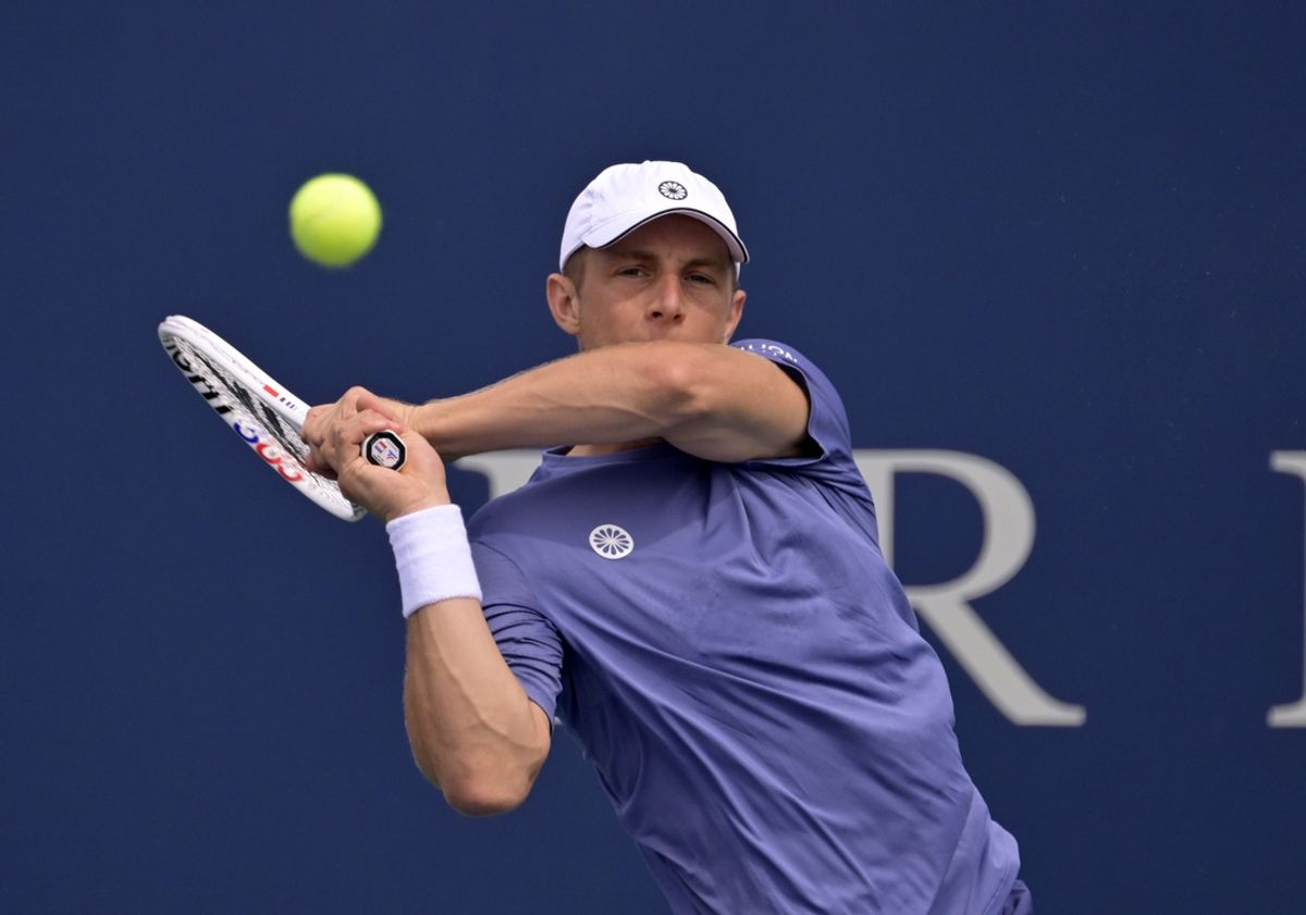 Aug 6, 2024; Montreal, Quebec, Canada; Tallon Griekspoor (NED) hits a backhand against Lorenzo Sonego (ITA) (not pictured) in first round play at IGA Stadium. Mandatory Credit: Eric Bolte-Imagn Images