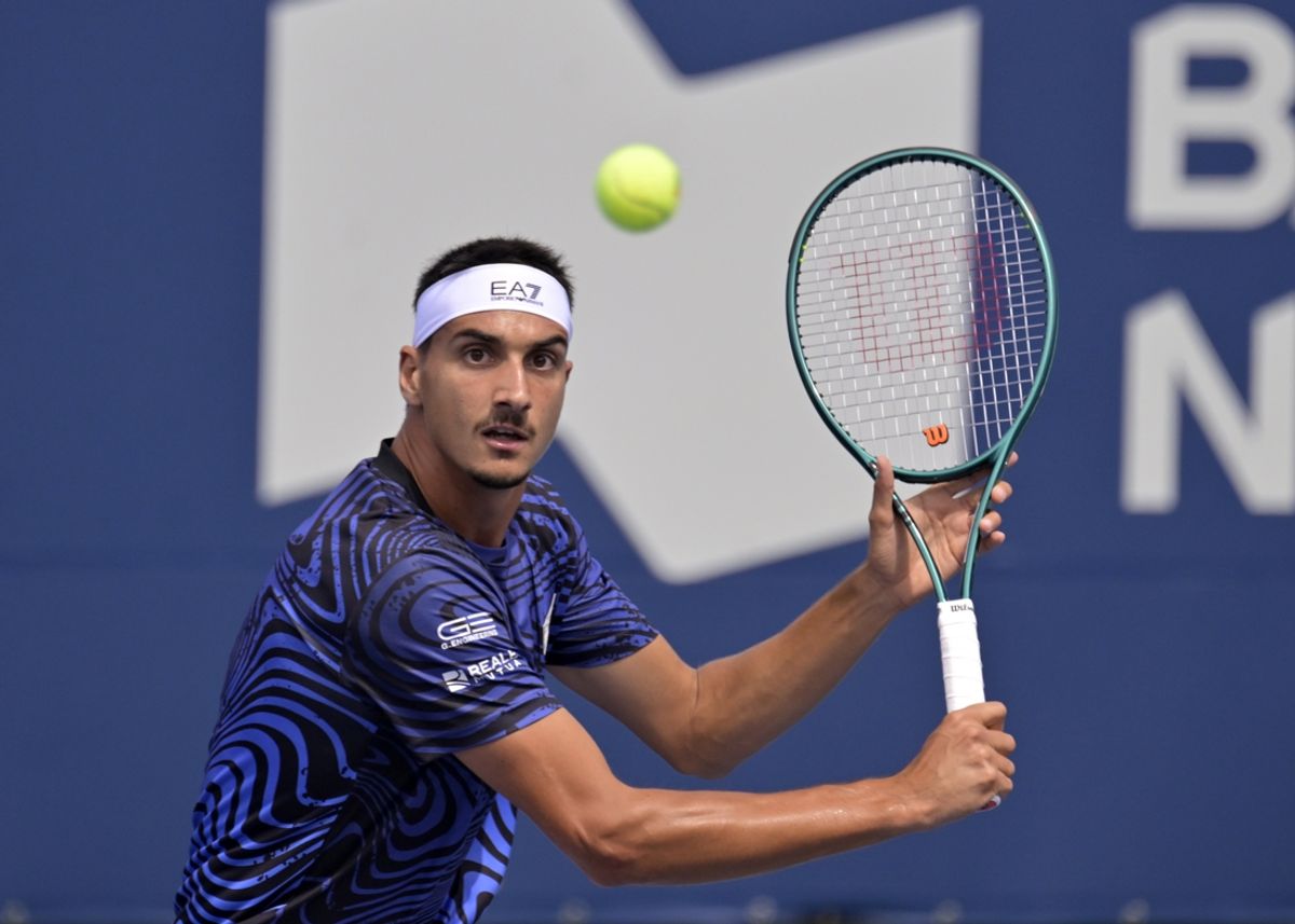 Aug 6, 2024; Montreal, Quebec, Canada; Lorenzo Sonego (ITA) volleys against Tallon Griekspoor (NED) (not pictured) in first round play at IGA Stadium. Mandatory Credit: Eric Bolte-USA TODAY Sports