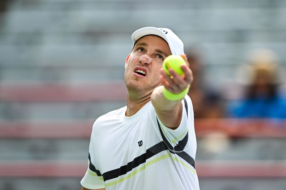 Aug 6, 2024; Montreal, Quebec, Canada; Nicolas Jarry (CHI) serves the ball to Tomas Martin Etcheverry (ARG) (not pictured) in first round play at IGA Stadium. Mandatory Credit: David Kirouac-Imagn Images
